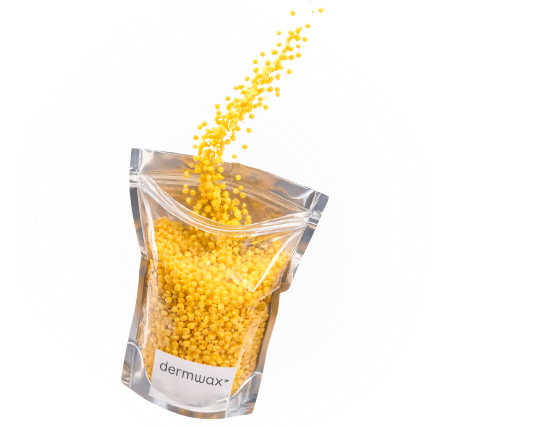 Clear bag of yellow wax pellets labeled 'dermwax' on a white background