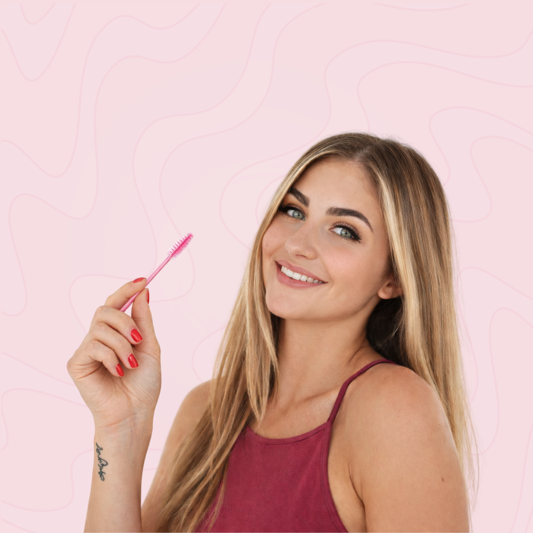 Woman holding a pink lash pen against a light pink background